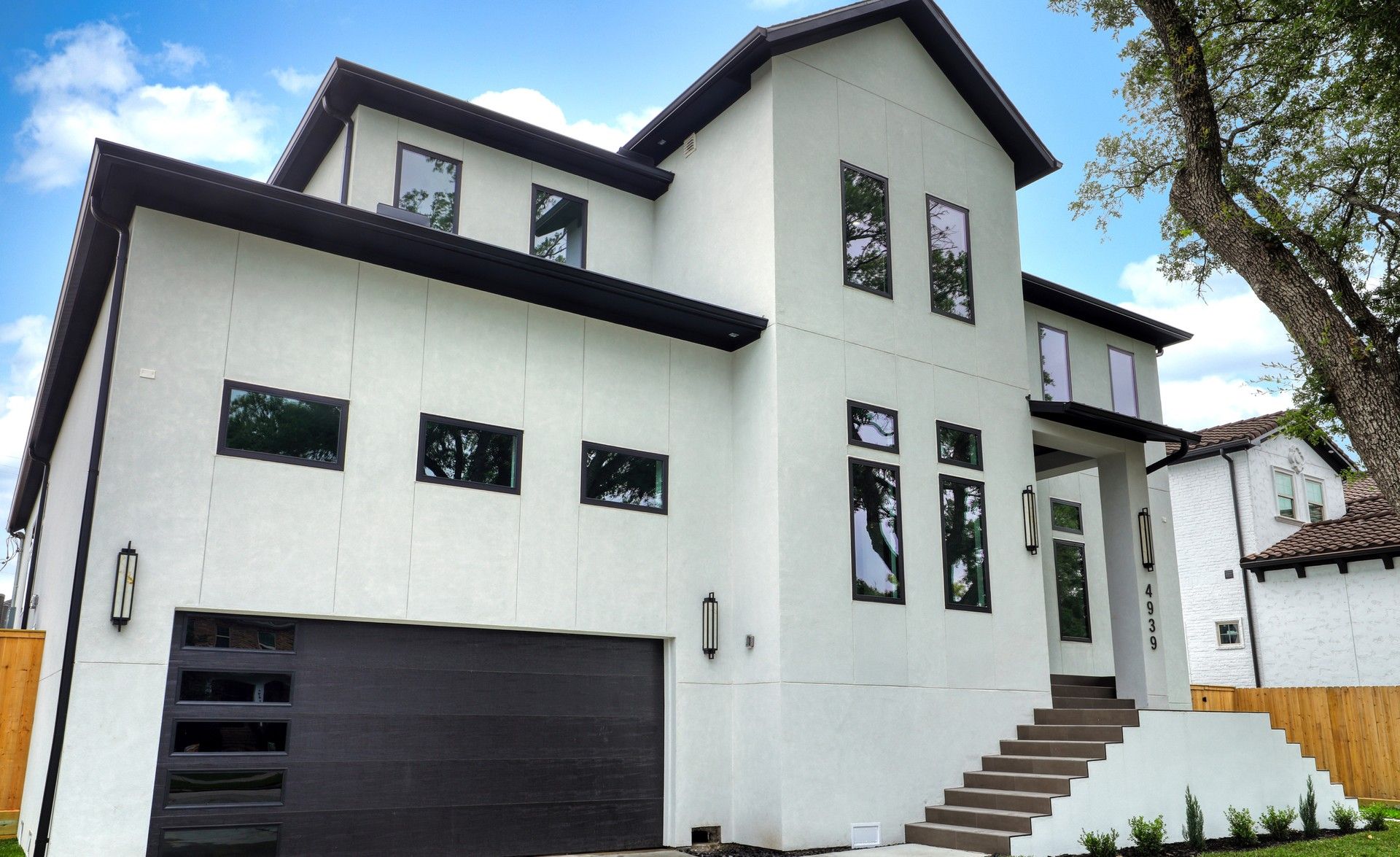Modern white two-story home exterior